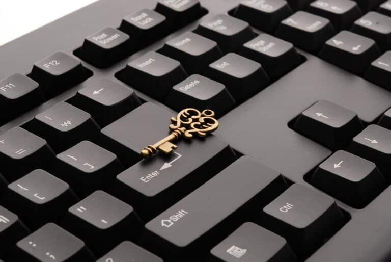 Close-up of a vintage key on keyboard keys – symbolizing unlocking a tech career pivot